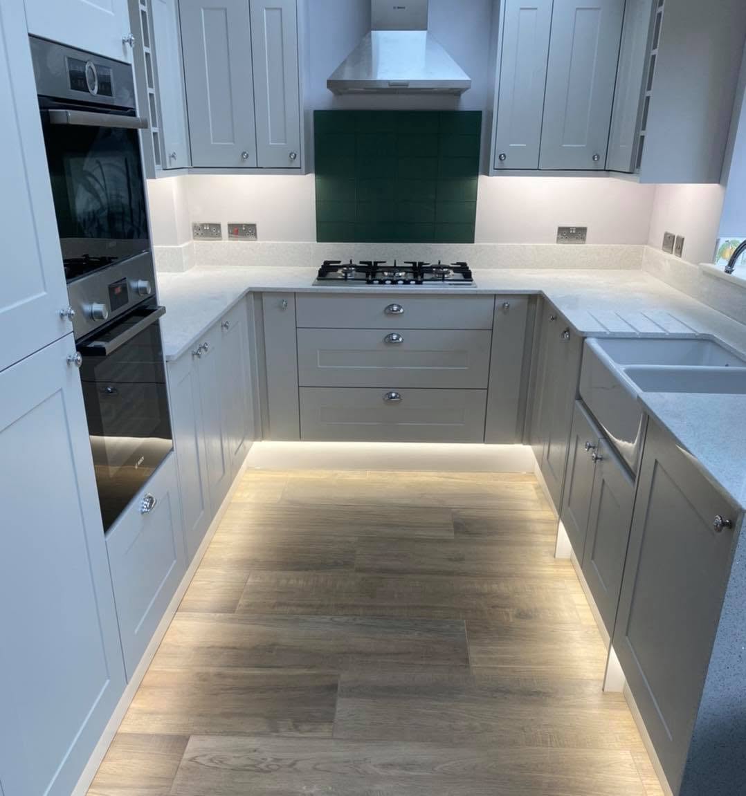Shaker kitchen with under-cabinet and plinth LED strip lighting